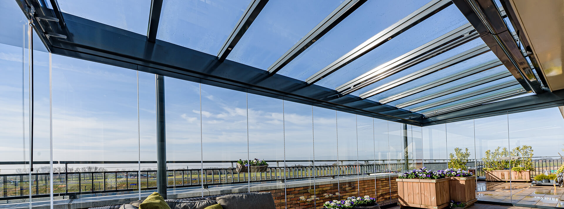 Glazen schuifwand tuinhuis 